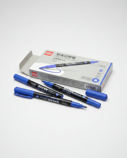 Deli double-headed marker pen set with packaging on a dark background