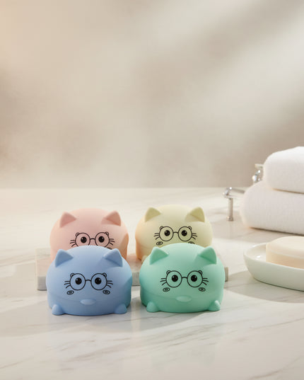 Four colorful piggy banks with cartoon faces on a white background