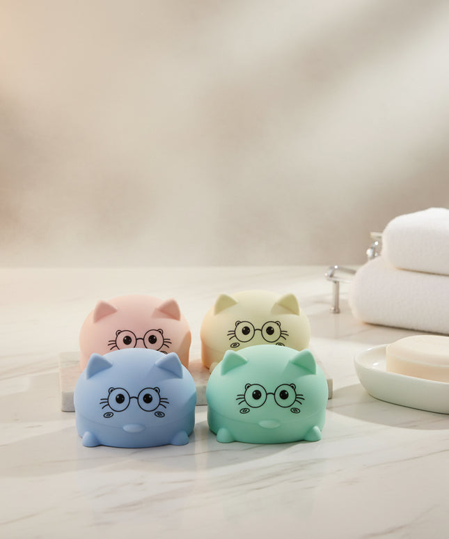 Four colorful piggy banks with cartoon faces on a white background