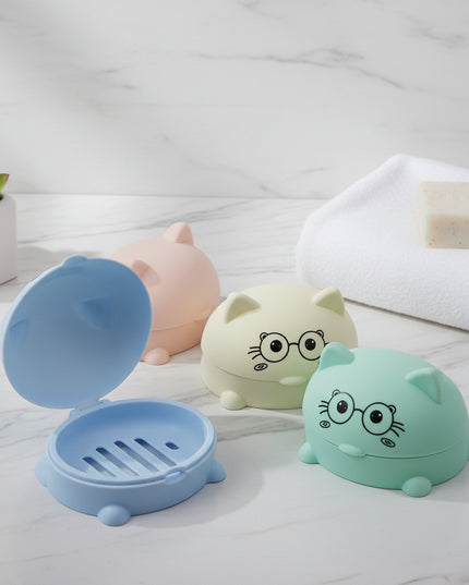 Three cartoon-style piggy banks in different colors on a white background