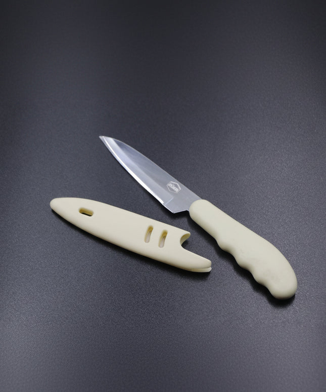 Paring knife with a beige handle on a dark gray background