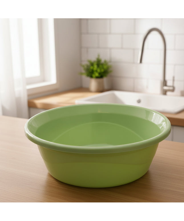 Green plastic basin with a label on a white background