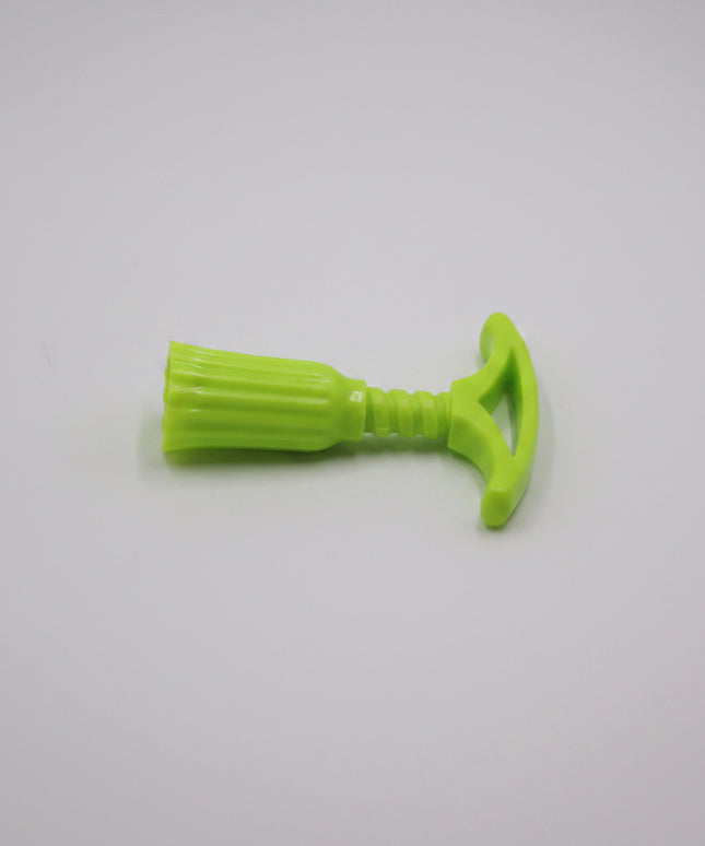 Green plastic tool on a white background