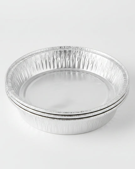 Aluminum foil containers with food labels on a white background