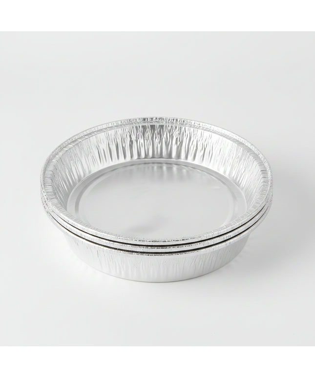 Aluminum foil containers with food labels on a white background