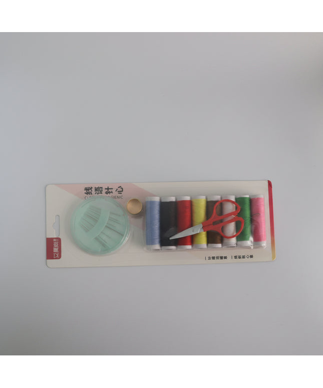 Set of sewing threads and scissors on a white background