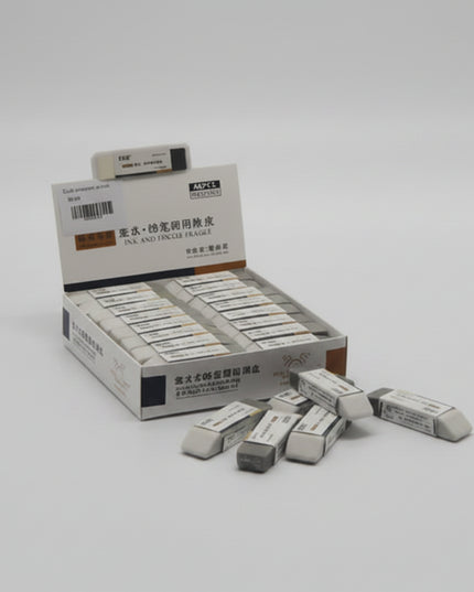 Box of ink cartridges with a few cartridges on a white background
