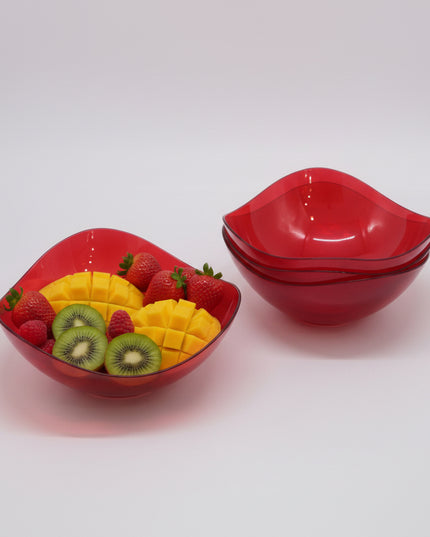Red plastic bowl with a yellow label on a white background