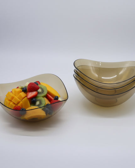 Beige ceramic bowl with a label on a white background