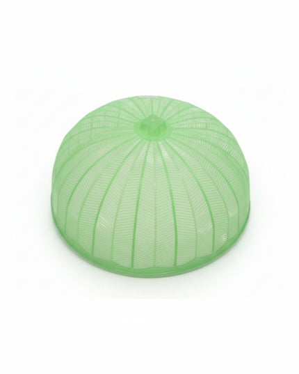 Green plastic dome cover on a white background