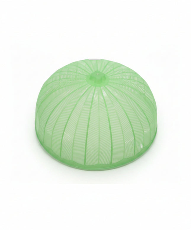 Green plastic dome cover on a white background