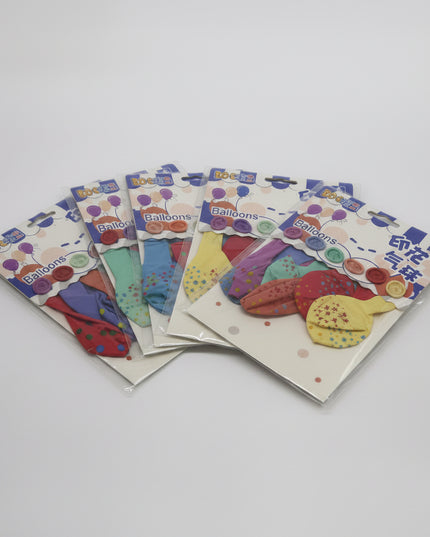 Colorful children's gloves in packaging on a white background
