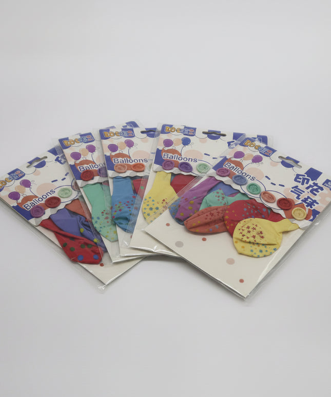 Colorful children's gloves in packaging on a white background
