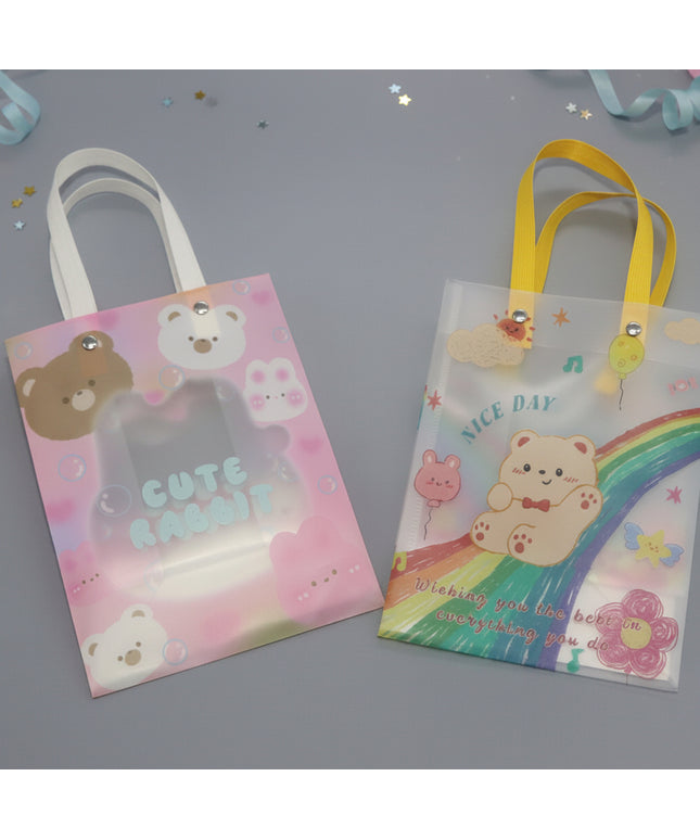 Two small bags with cartoon bear designs on a gray background