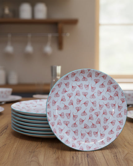 Stack of round plates with a floral pattern on a beige background