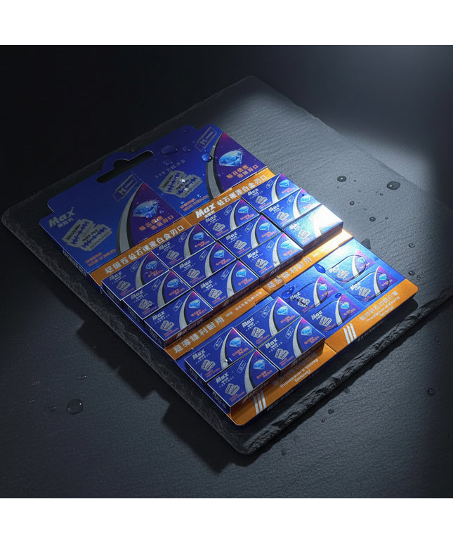 Multiple boxes of Max brand products on a dark background