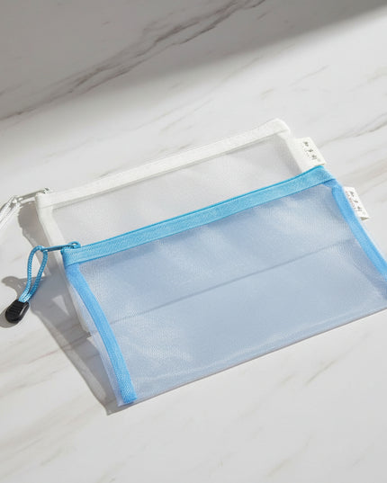 Two mesh pouches, one gray and one blue, with zippers on a black background.