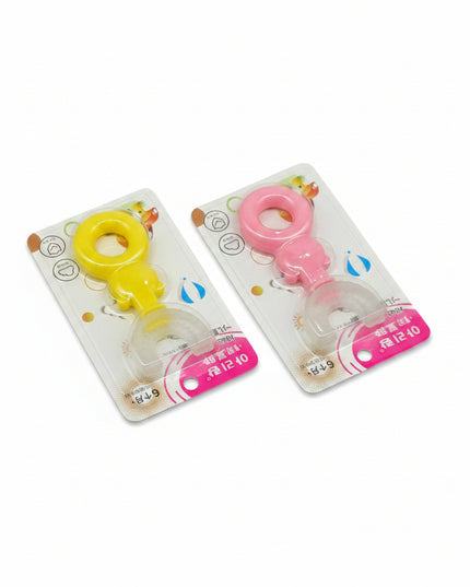 Two baby teether toys in packaging on a dark background