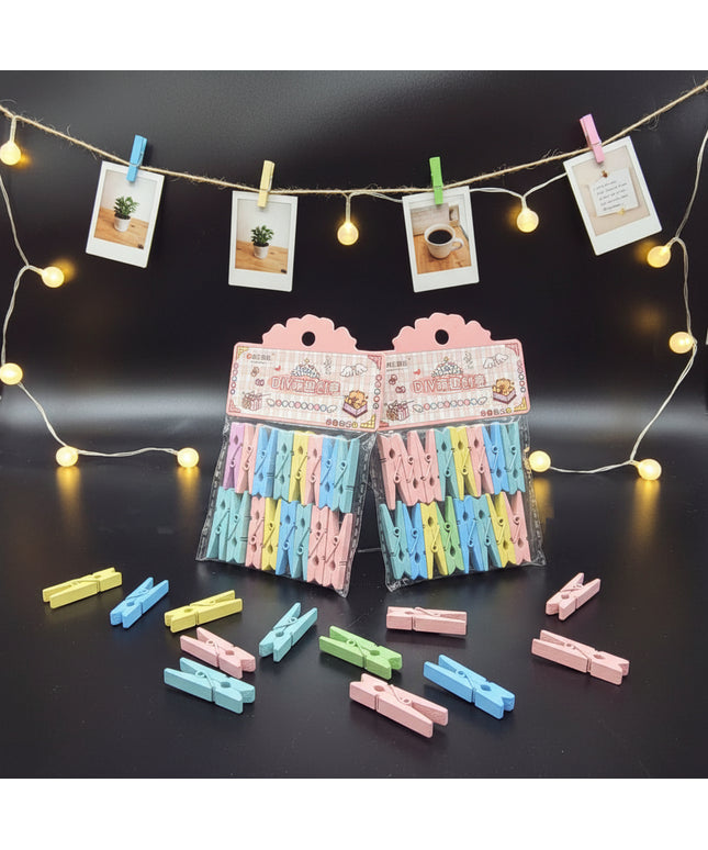 Packaged colorful clothespins on a black background