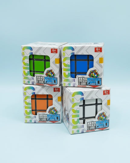 Four stacked toy boxes with colorful designs on a dark background