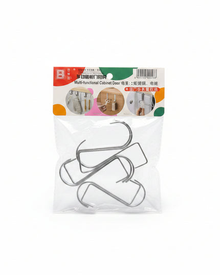 Packaged metal hooks with a clear plastic cover on a dark background