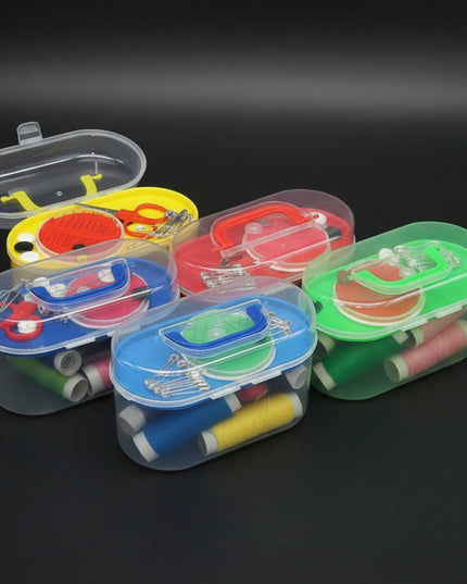 Set of colorful fishing lures in transparent containers on a black background