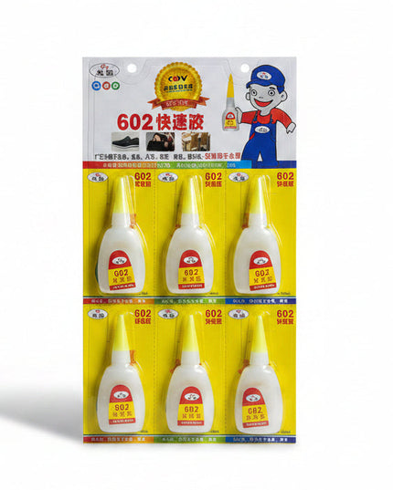 Packaging of 602 quick-drying glue with cartoon character on a dark background