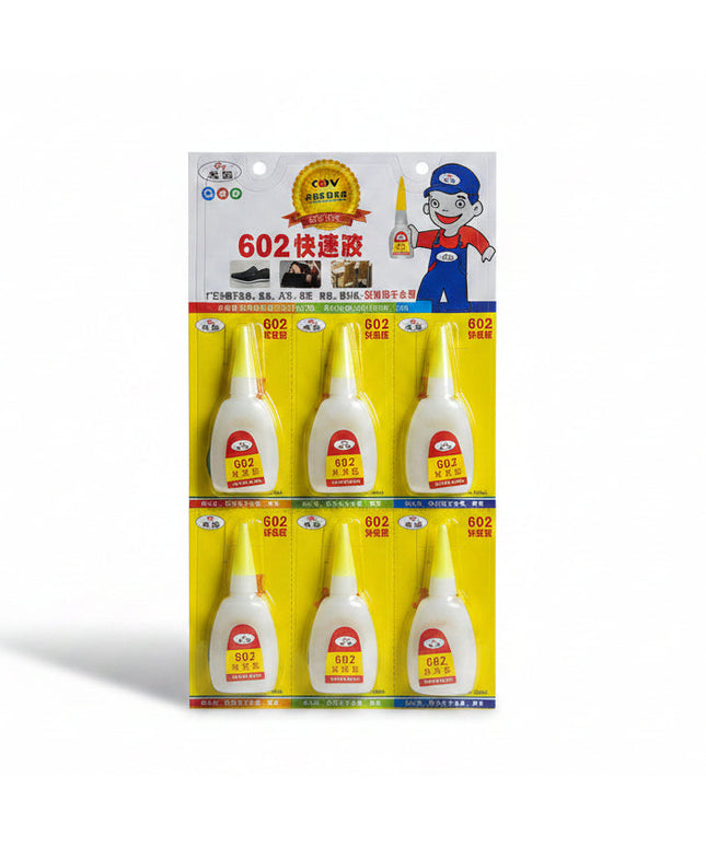 Packaging of 602 quick-drying glue with cartoon character on a dark background