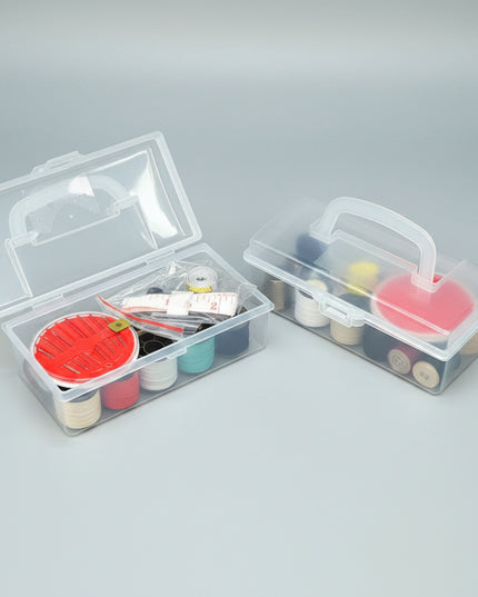 Two clear plastic tackle boxes with fishing lures on a dark background