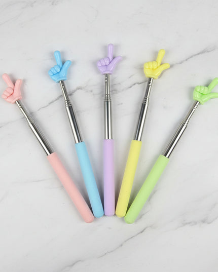 Set of five colorful pens with finger-shaped tips on a dark background