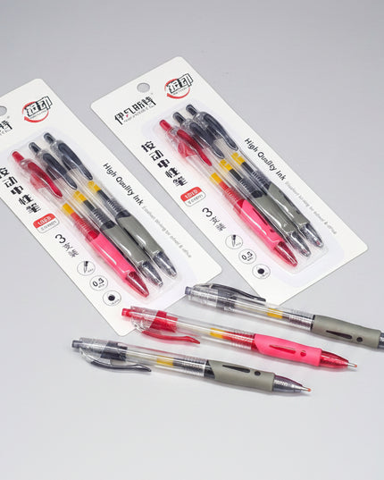Two packages of mechanical pencils on a dark background