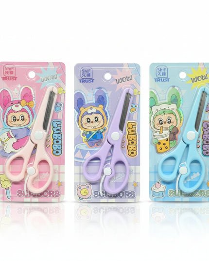 Three pairs of children's scissors with colorful packaging on a dark background
